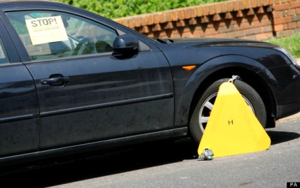Illegally parked car clamped